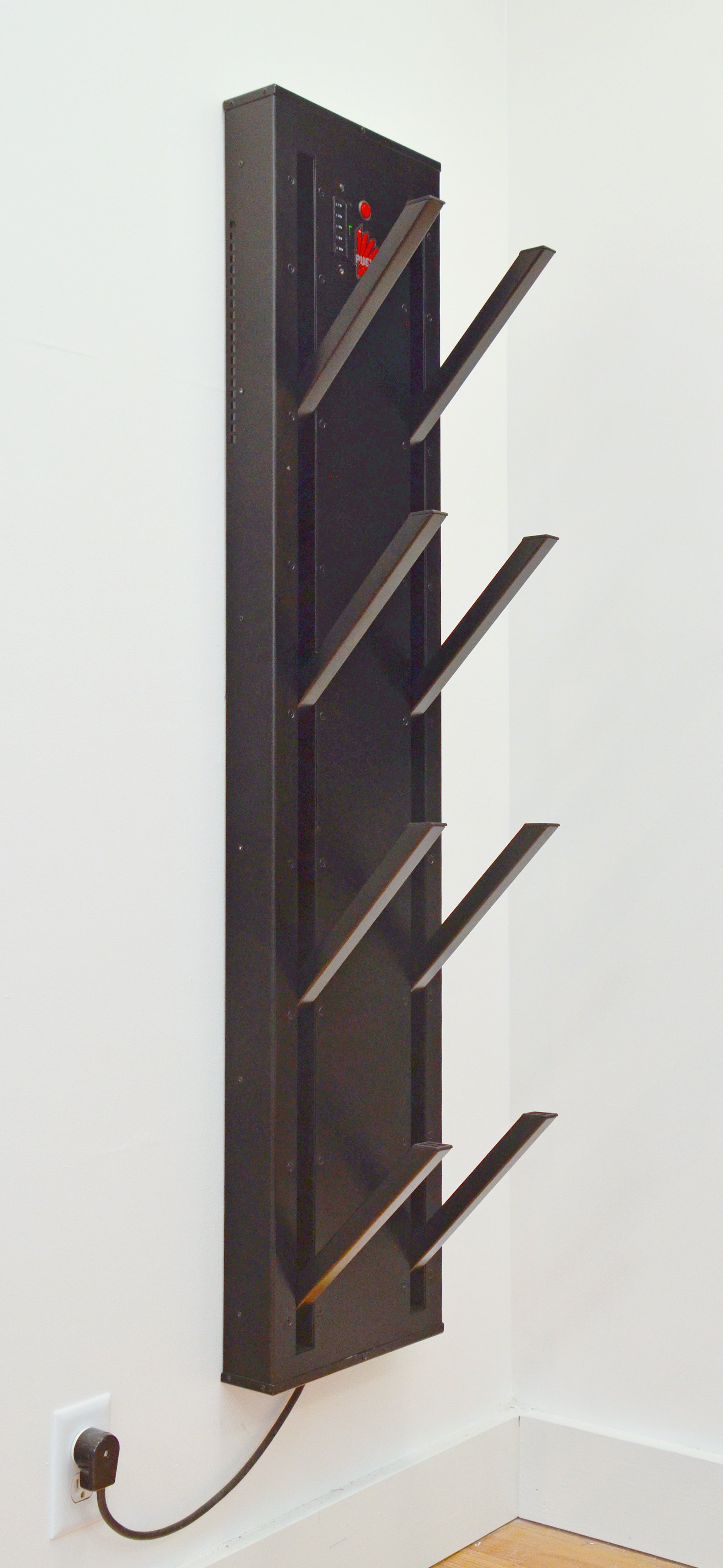 Boot Dryer from Puelche.  Black dryer with pegs open for wall mounting.