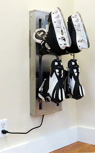 Boot Dryer wall mounted. Two pair stainless steel. Warm or ambient air. Attractive space saving design best for ski homes , condos and any mudroom. Timer controlled dryer for ski boots, skates, gloves. Shown with skates, ski boots. Puelche Dryer